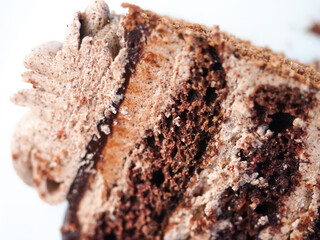 Sweet eating chocolate cake close up