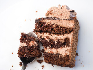 Sweet eating chocolate cake close up