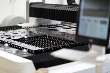 metal sheet on work table of laser cutting machine