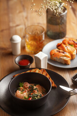 Gourmet meat meals assortment flat lay. Top view on restaurant table with menu of tasty grilled snacks. Concept for restaurant menu.