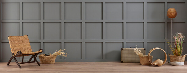 Fototapeta na wymiar Grey decorative wall background and wicker chair bag accessory style with cotton flower style.