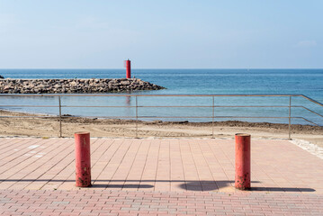 Obraz premium Set of three red posts in symmetrical composition