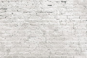 Texture of old brick wall sprayed with stucco mortar as background