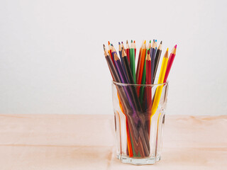 Set of colored pencil in a glass. Crayons for creativity