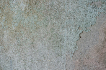 Old cement wall with discolored paint
