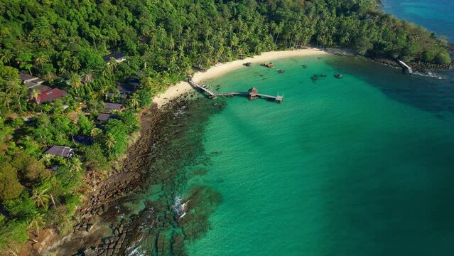 Aerial shot of Koh Kood island beach showing the bay with white sand and rocks