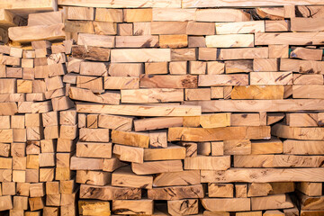 Obraz premium Warehouse wood closeup. At the sawmill plant wooden blanks for furniture and construction.