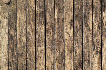old brown boards shield grass