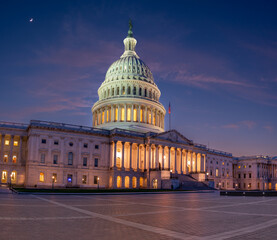 Side Profile of the US Capitol At Sunset With Empty Square
