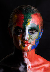 Fashion makeup. Woman with colorful makeup and body art