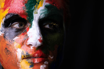 Fashion makeup. Woman with colorful makeup and body art