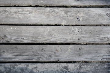 Obraz premium Old rough wooden desks with nails