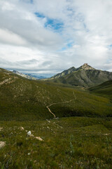 Hiking trail between the mountains in the Witfontein nature reserve with mountain at the back.