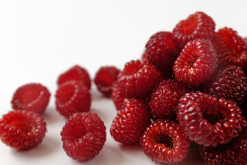 raspberries on a white background