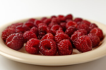 raspberries on a white background