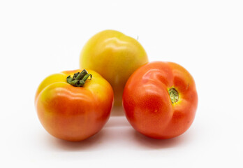 organic tomatoes isolated on white background