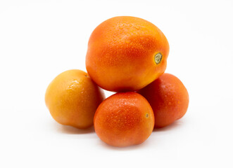 ripe tomato on white background