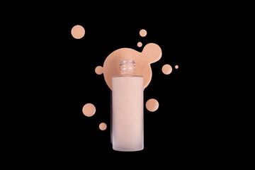 Bottle of makeup foundation and samples on black background. Liquid foundation cream unbranded bottle. BB cream for professional make-up, eyedropper for applying. Mock up concept
