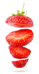 Strawberries cut into pieces flies on a white. Isolated