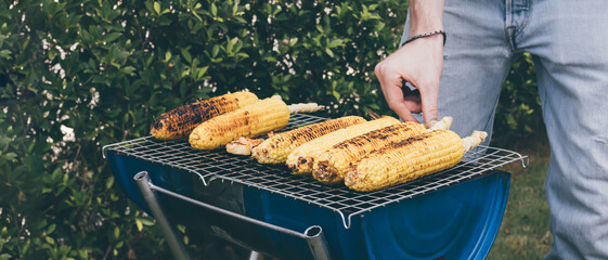 Grilled sweet corn on the charcoal grill