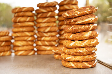 Street fast food selling simits in Istanbul,Turkey,close-up shot.Concept of turkish bread,bagels