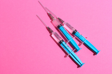 Disposable plastic syringe prepared for injection and vaccination in the hospital. The concept of medicine and health