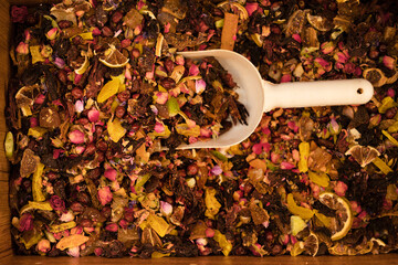 Close-up of dried fruit and berry tea leaves, teashop concept. Top view,background