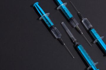 Disposable plastic syringe prepared for injection and vaccination in the hospital. The concept of medicine and health