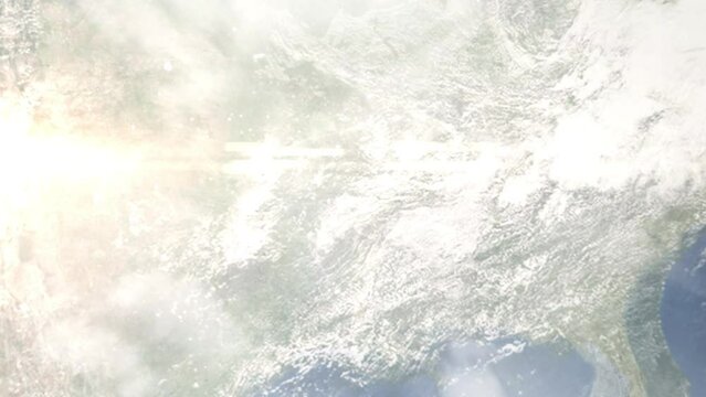 Earth zoom in from outer space to city. Zooming on Little Rock, Arkansas, USA. The animation continues by zoom out through clouds and atmosphere into space. Images from NASA