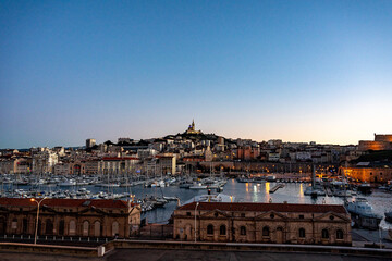 Fototapeta na wymiar France. Bouche-du-Rhone (13) Marseille. The old port of Marseille in the background the Basilica of Notre Dame de la Garde