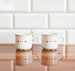 Vintage porcelain cups with heart pattern