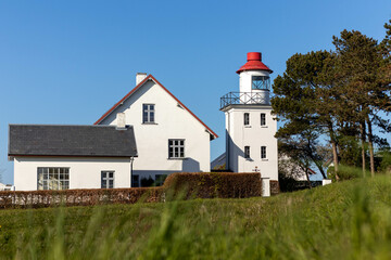Fototapeta na wymiar Lighthouse on the coast of Tranekær