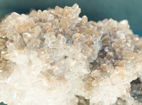 Close-up of clasters of quartz crystals background. Texture of quartz crystals.
