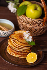 Pancakes with honey, lemon and apple