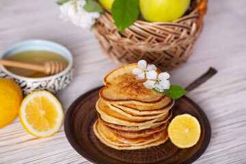 Pancakes with honey, lemon and apple