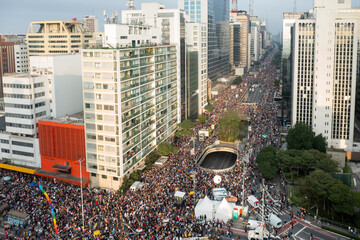 São Paulo, SP, Brazil, JUN 19, 2022: Aerial drone footage on Paulista avenue of the Gay Pride Parade, flag at the LGBTQIA+ Pride party, 26th gay parade
