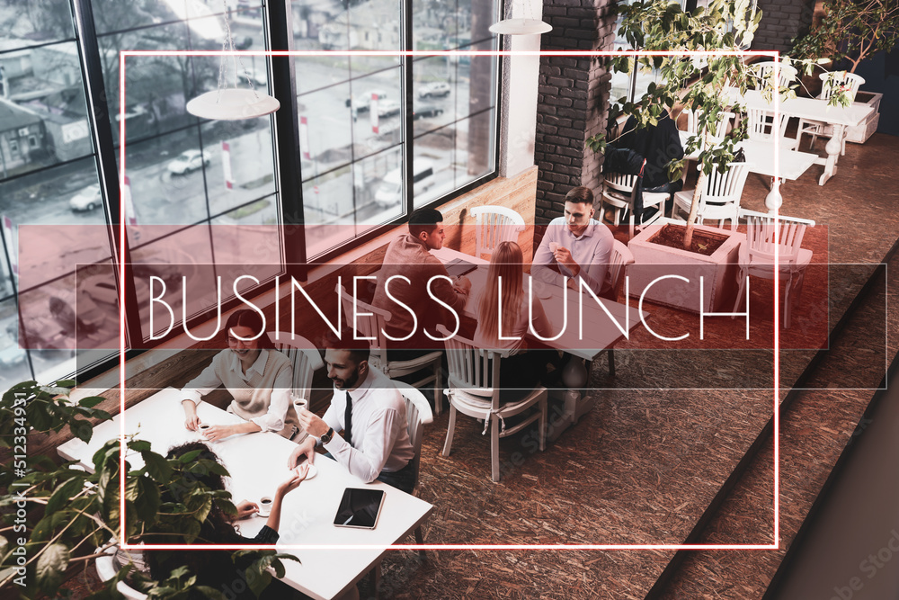 Canvas Prints group of coworkers having coffee break in cafe, above view. business lunch