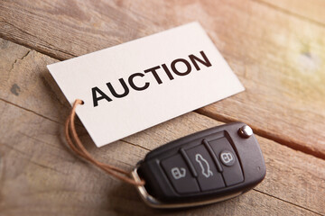 Car Auction concept. Vehicle security key with tag on the