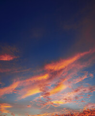 Fototapeta na wymiar sunset in the sky with beautiful clouds