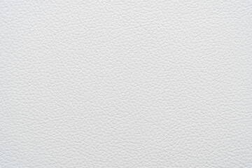 White natural leather with grainy texture for background.