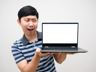 Portrait man striped shirt excited emotion looking at laptop white screen