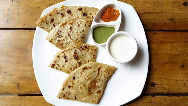 Indian famous food aloo paratha seen from top