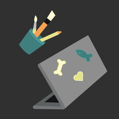Laptop, pencil stand. Open laptop, stickers, pencil, brushes.