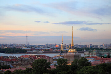 Naklejka premium The Admiralty gilded spire, topped by a small sail warship, and Peter and Paul Cathedral, Saint Petersburg, Russia