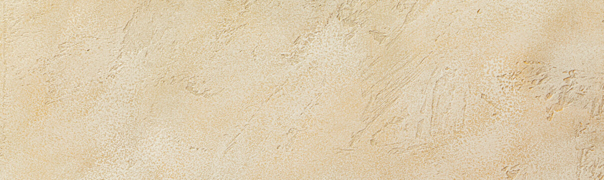 Sand color seamless stone texture for header banner. Beige plaster background