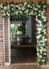 Door Frame Decorated With Flowers Entrance To Reception Hall
