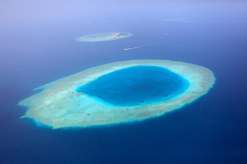 Fototapeta na wymiar Aerial view of a maldivian island, Maldives