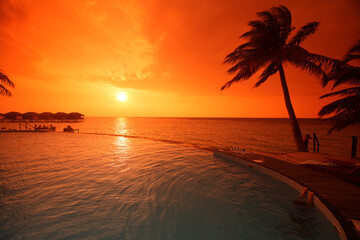 Sunset over the swimming pool, Filitheyo island, Maldives