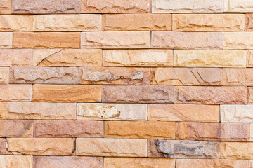 Brown brick wall texture with rough pattern Wallpaper background. Brick wall.