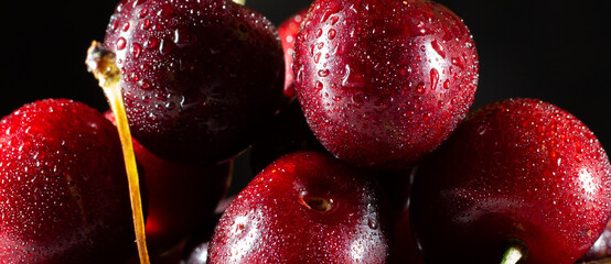 Stock Photo on the subject close up, macro. Large ripe cherries, moist with water